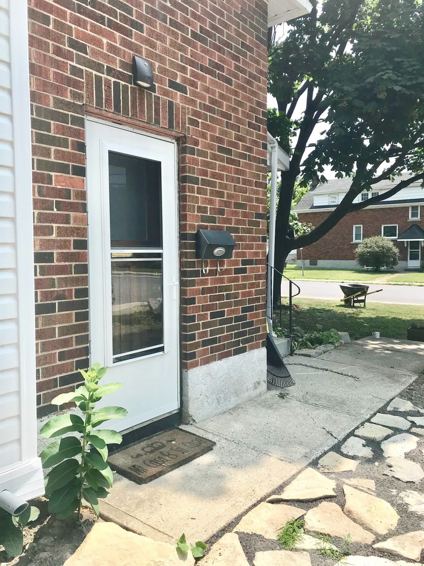 Brick exterior and side approach at 211 Park Street
